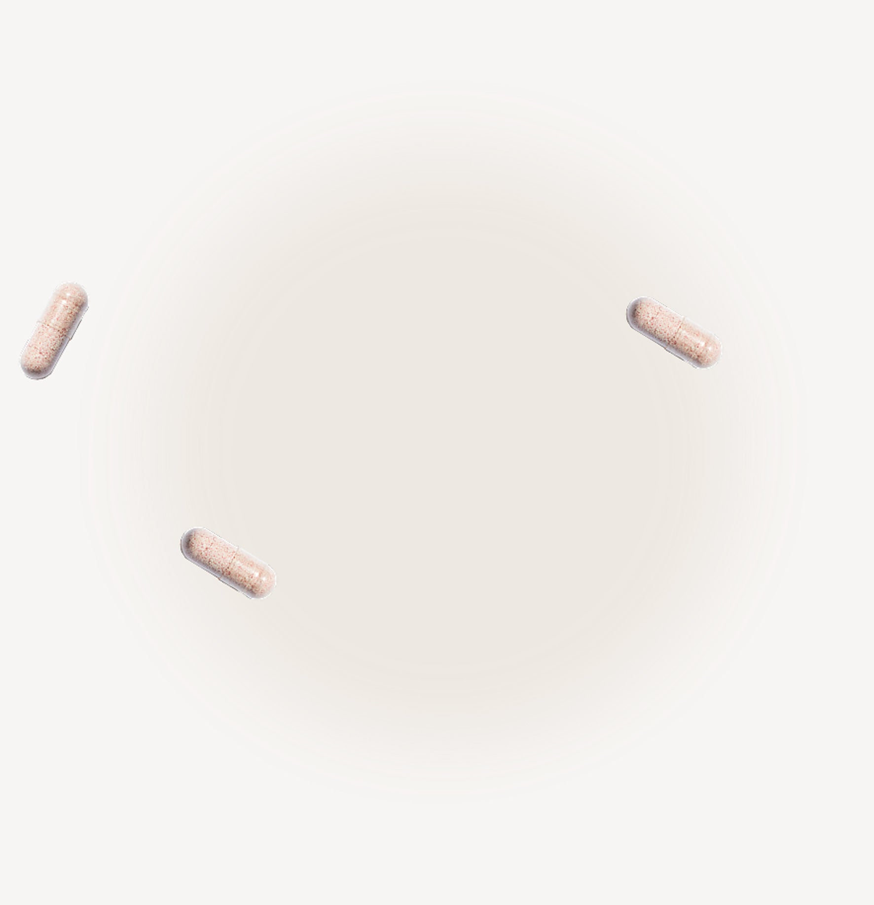 Three pink cylindrical objects on a white background